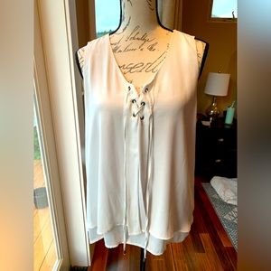 Sleeveless blouse size L